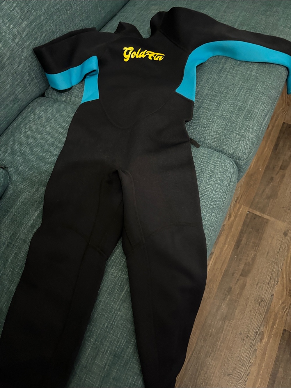 Kids Black One-Piece Wetsuit with Teal Accents